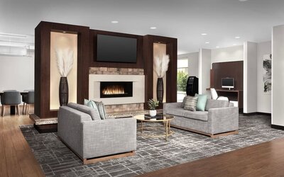 Lobby and coworking lounge at TownePlace Suites Franklin Cool Springs.