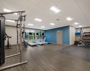 Spacious fitness center at Hampton Inn Detroit Southfield.
