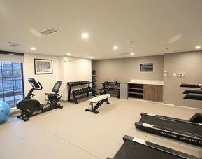 Fitness center available at MainStay Suites Oak Brook Terrace - Chicago.