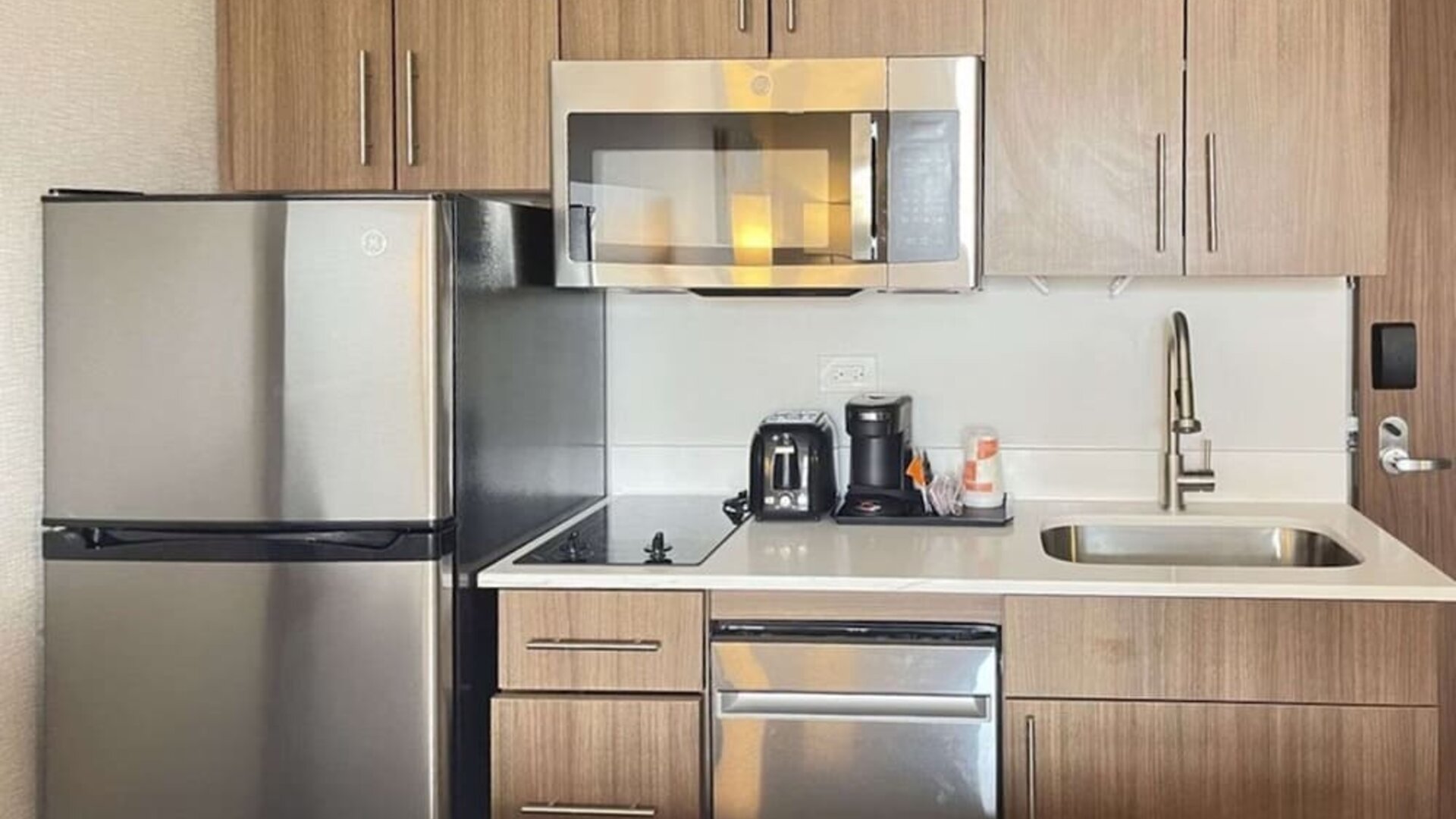 In-room kitchen available at MainStay Suites Oak Brook Terrace - Chicago.
