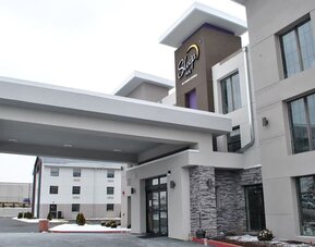 Entrance and parking area at Sleep Inn Oakbrook Terrace.