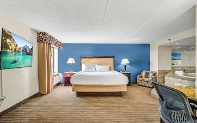 Day use suite with work desk and hot tub at Radisson Hotel Schaumburg.