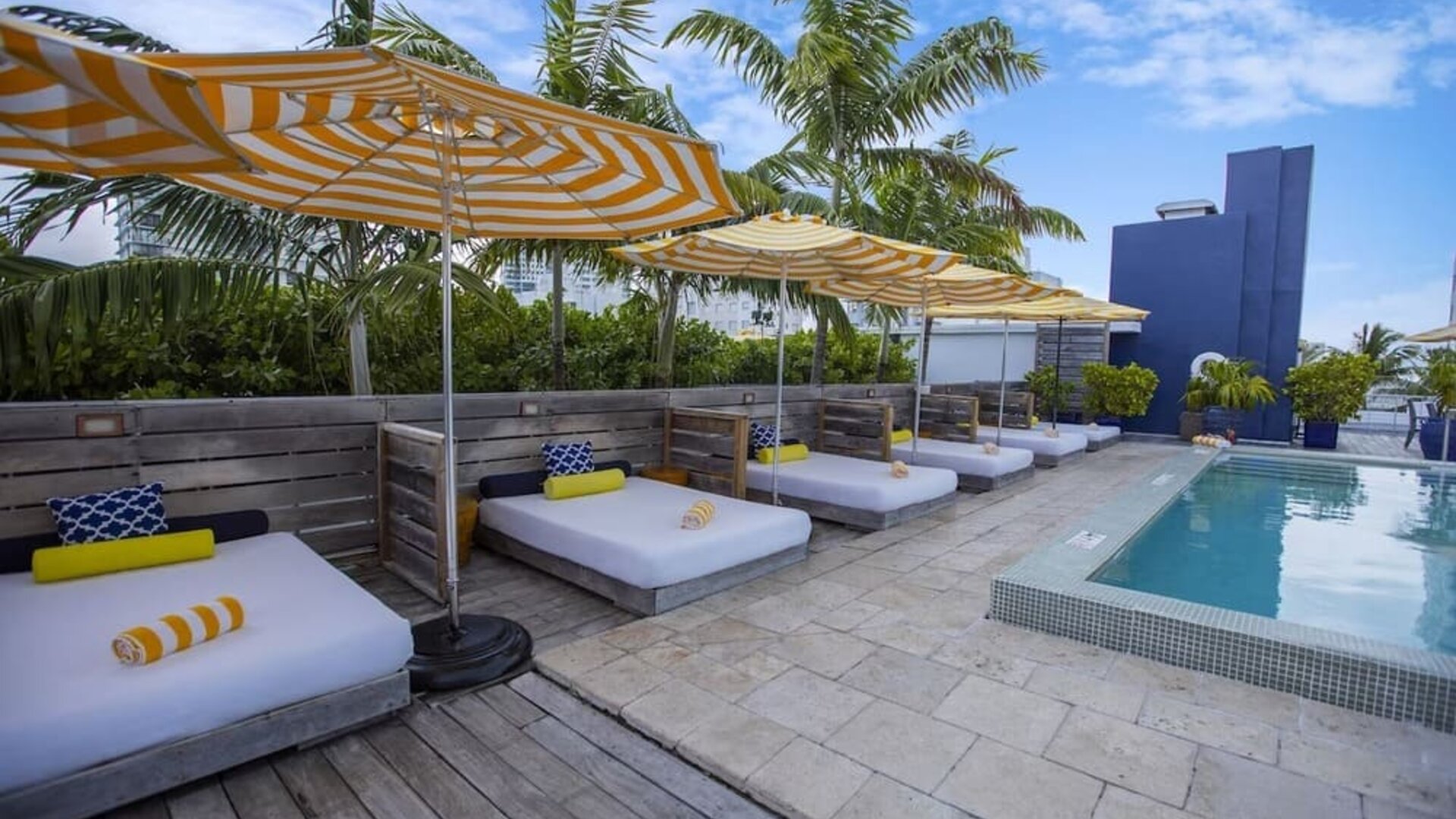 Outdoor pool with lounge beds at Catalina Hotel & Beach Club.
