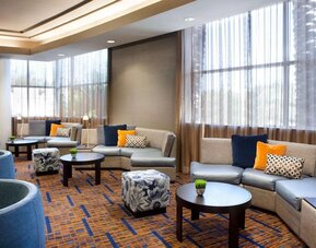 Lobby lounge and workspace at Sonesta Emeryville Oakland.