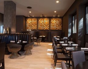 Hotel restaurant at H Hotel Los Angeles, Curio Collection By Hilton.