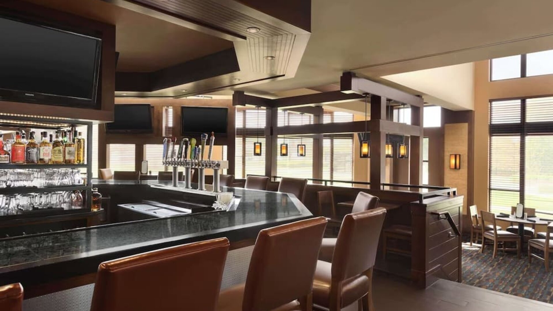 Hotel bar with lounge seating at DoubleTree By Hilton Hartford - Bradley Airport.