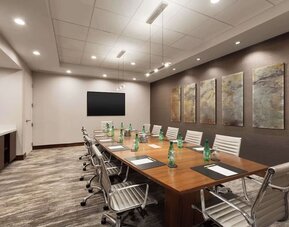 Professional meeting room with ergonomic chairs at DoubleTree By Hilton Hartford - Bradley Airport.