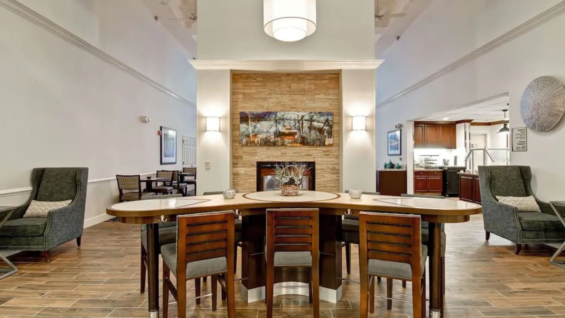 Lobby lounge and workspace at Homewood Suites By Hilton Newark-Cranford.