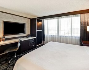 Day use room with work desk and natural light at Embassy Suites By Hilton Santa Clara Silicon Valley.