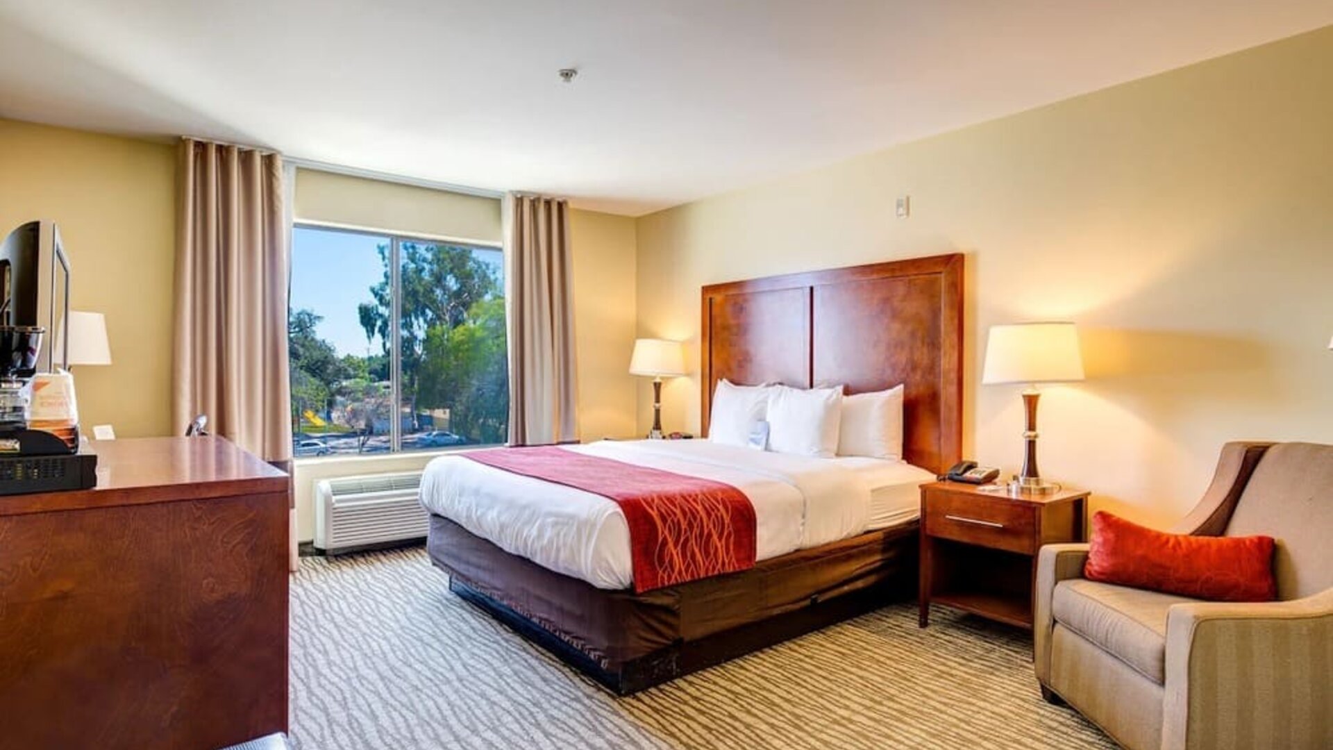 Dayroom with TV and natural light at Comfort Inn Pomona Near Fairplex.
