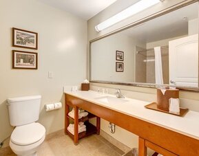 Private guest bathroom with shower at Comfort Inn Pomona Near Fairplex.