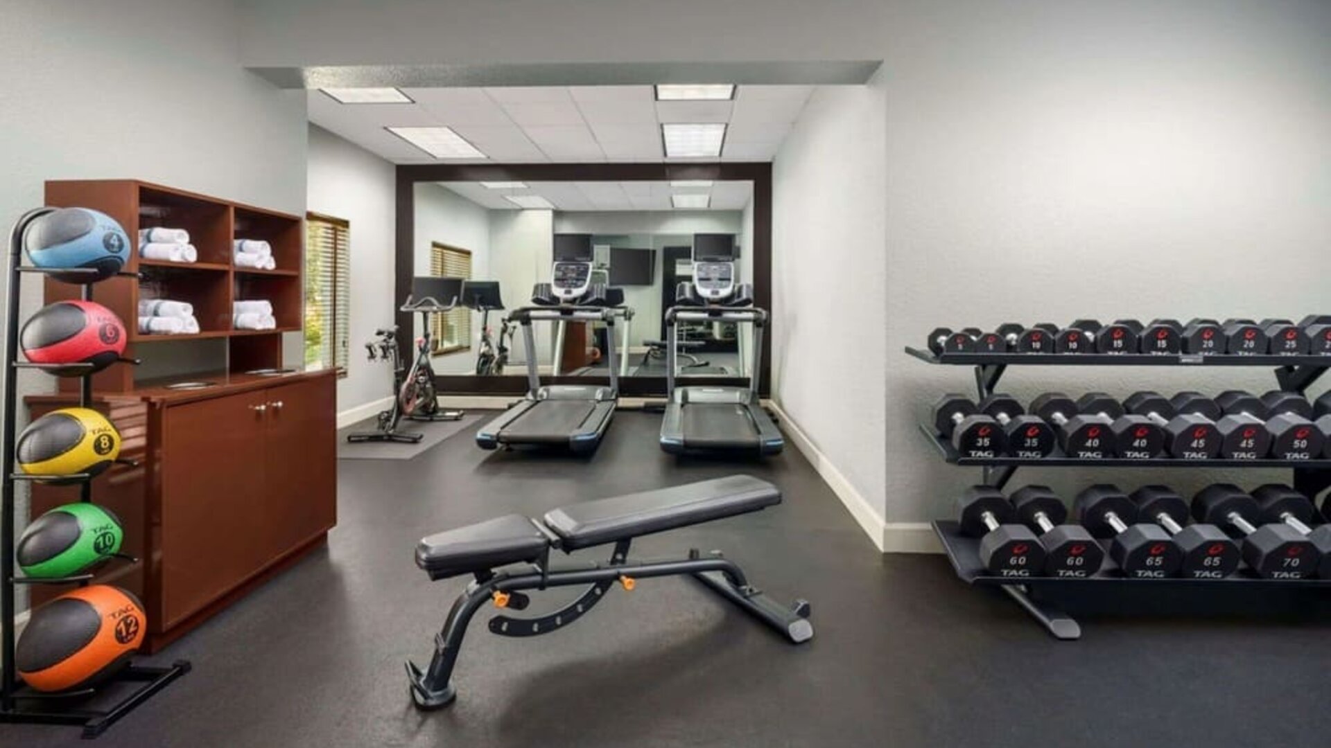 Fitness center at Homewood Suites By Hilton Miami Airport-Blue Lagoon.