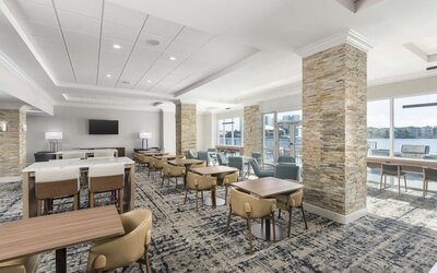 Dining area and coworking space at Homewood Suites By Hilton Miami Airport-Blue Lagoon.