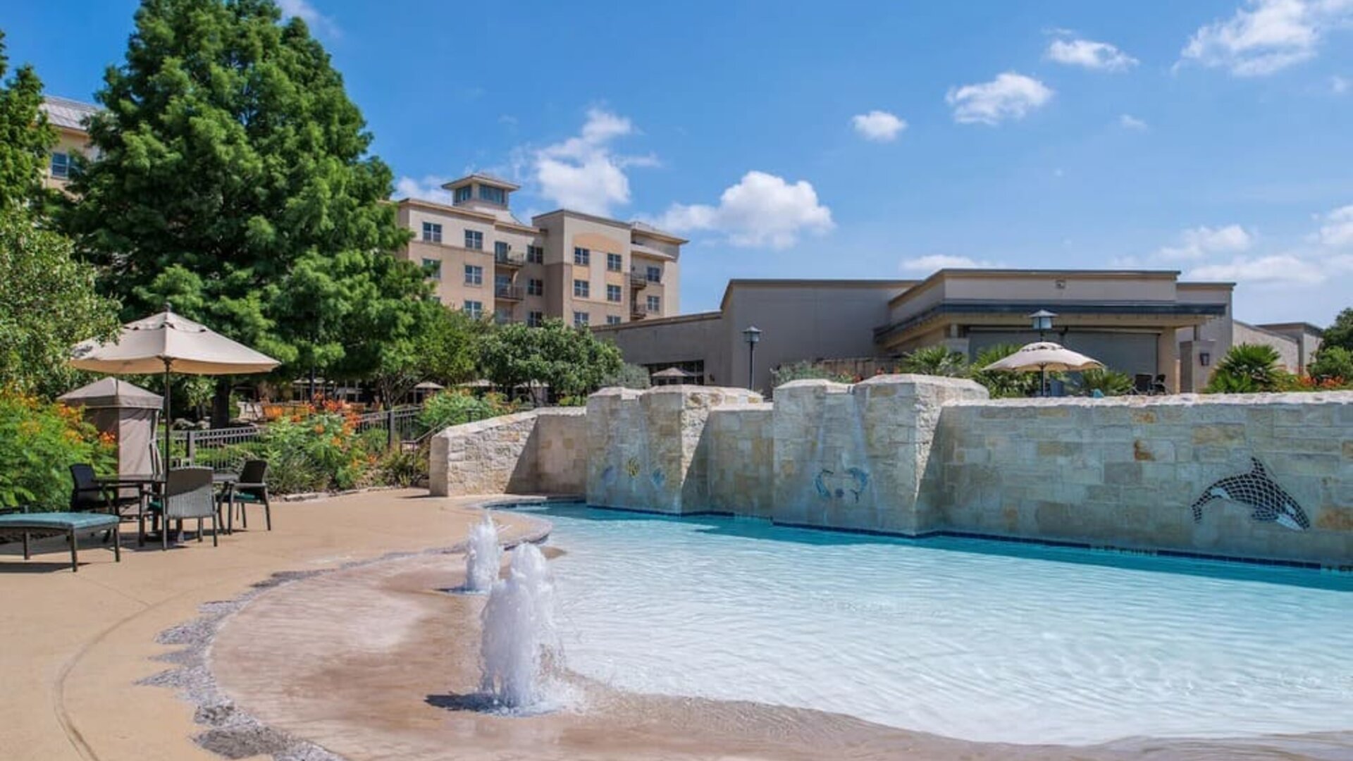 One of the 3 outdoor pools at Hilton San Antonio Hill Country.