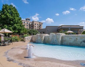 One of the 3 outdoor pools at Hilton San Antonio Hill Country.