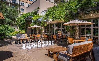 Outdoor garden and coworking space at Hilton San Antonio Hill Country.
