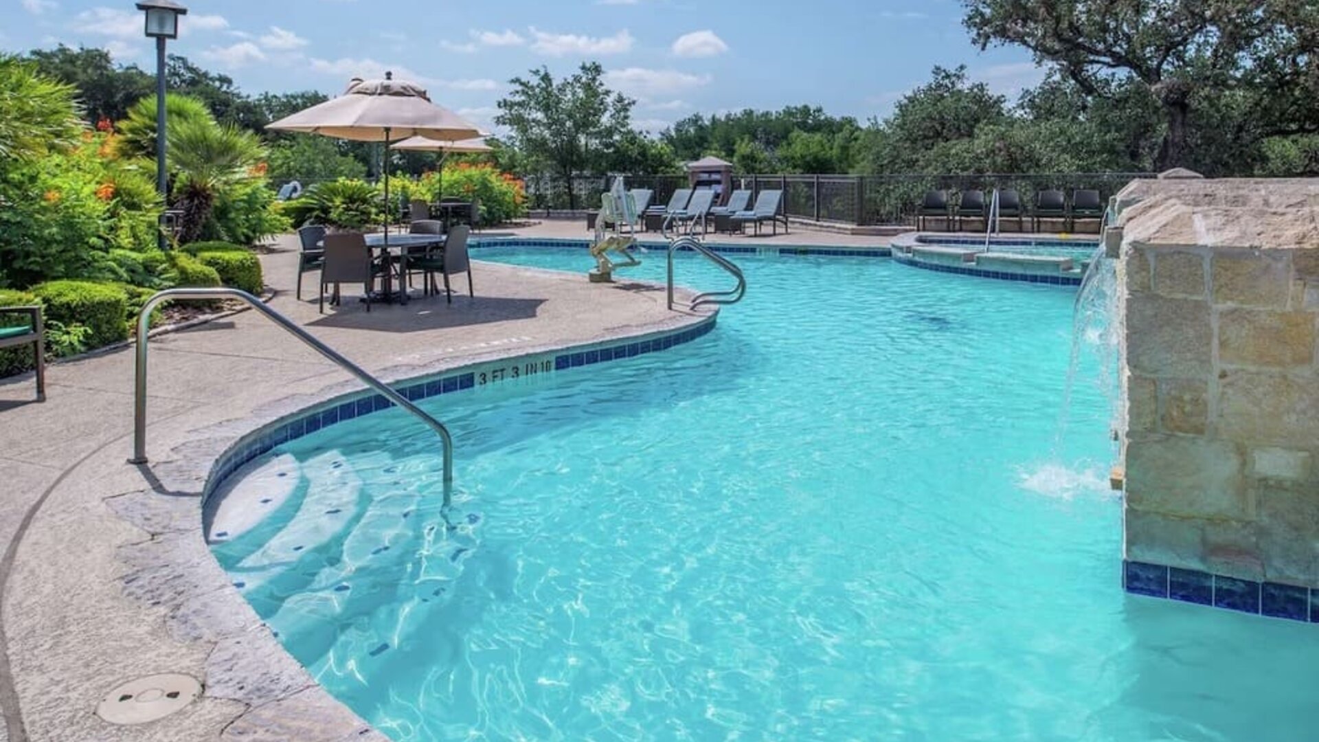 Relaxing pool area at Hilton San Antonio Hill Country.