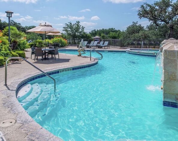 Relaxing pool area at Hilton San Antonio Hill Country.