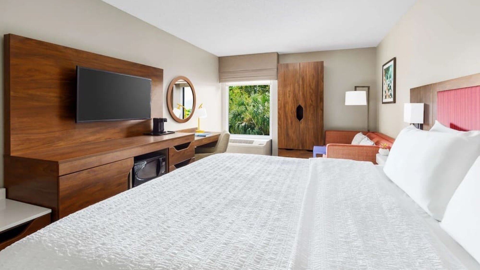 Day use room with work desk and natural light at Hampton Inn Ft. Lauderdale-Cypress Creek.