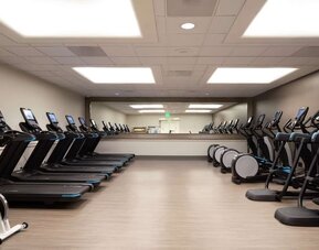 Equipped fitness center at Hilton Los Angeles Airport.