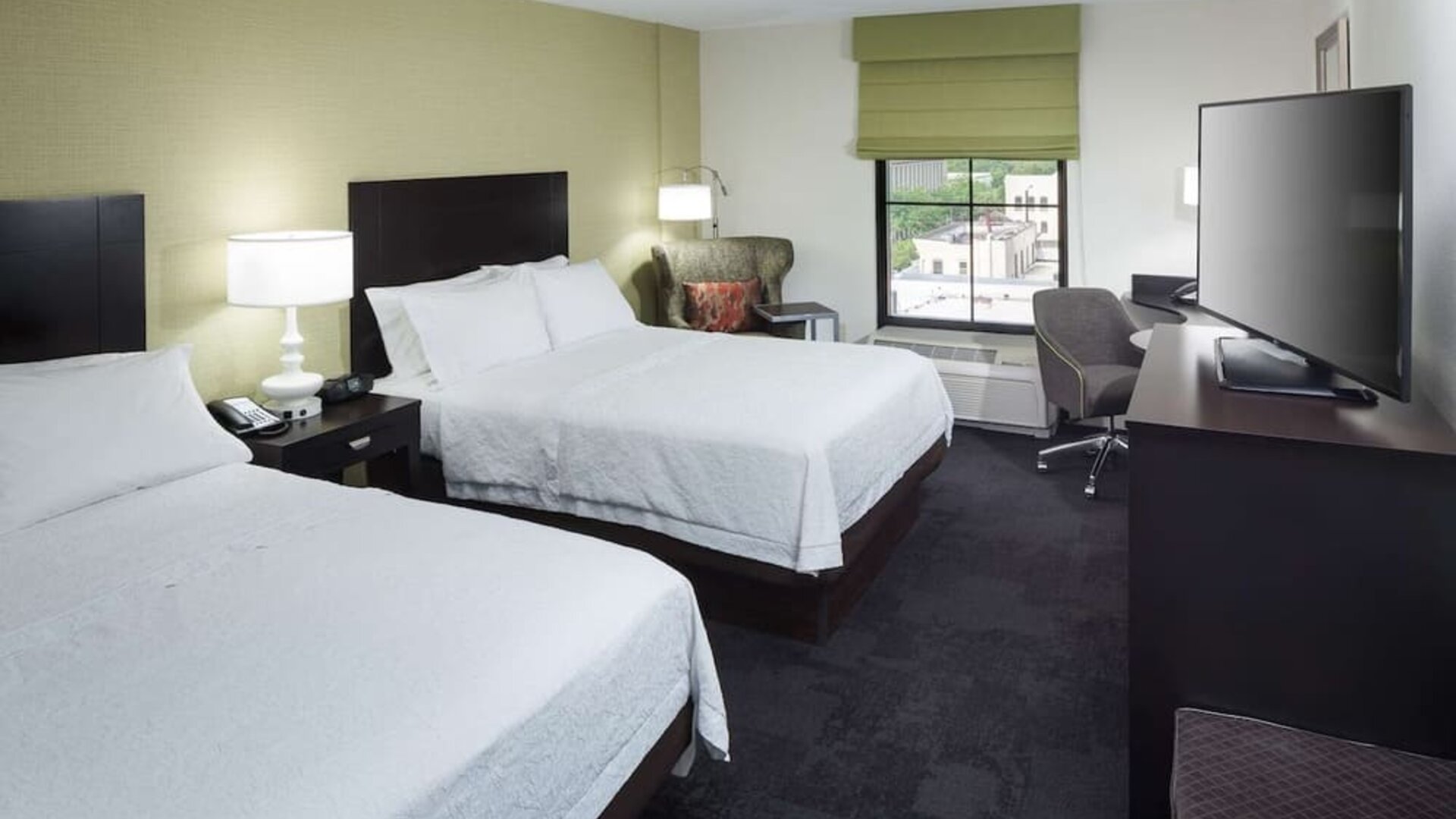 Day use twin room with work desk at Hampton Inn & Suites Gainesville-Downtown.