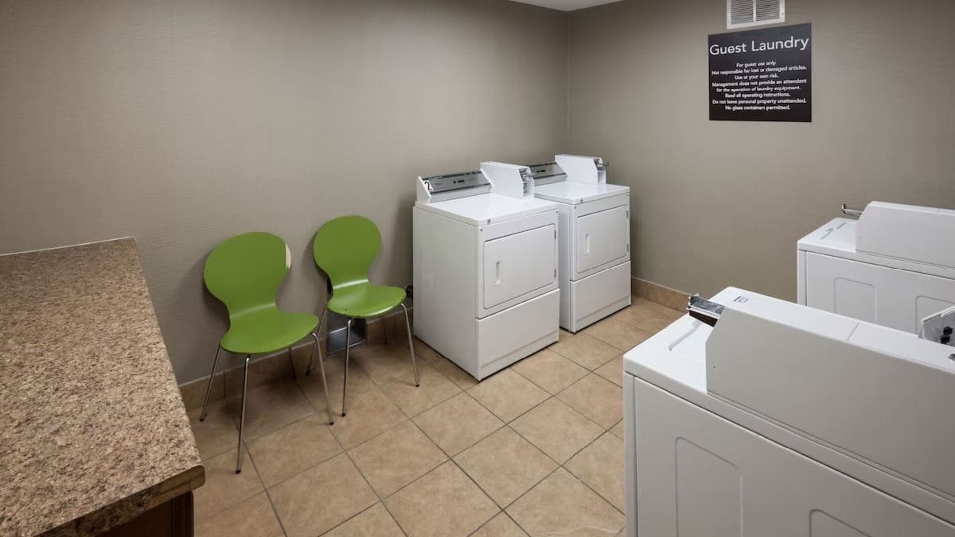 Launry room at Homewood Suites By Hilton Denton.