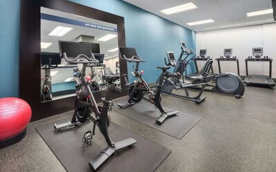 Fully equipped fitness center at Hampton Inn Manhattan/Times Square Central.