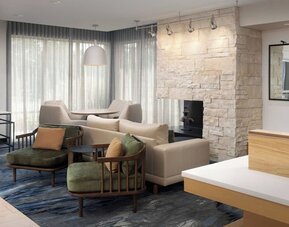 Lobby lounge area at Fairfield Inn & Suites By Marriott Baltimore BWI Airport.