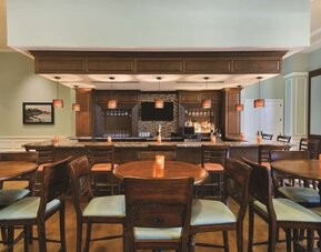 On-site bar and restaurant at Embassy Suites By Hilton Savannah.