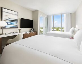 Day use twin room with work desk at The Altair Hotel Bay Harbor.