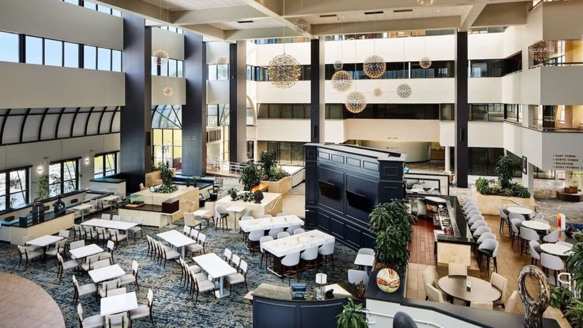 Lobby at Embassy Suites By Hilton West Palm Beach Central.