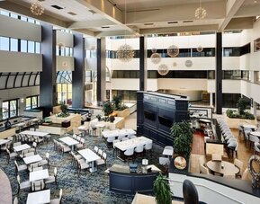 Lobby at Embassy Suites By Hilton West Palm Beach Central.