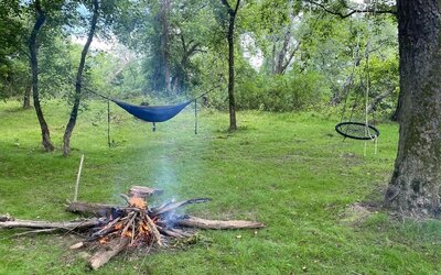 Courtyard with fireplace and lounge area at SKYLARANNA Resort & Spa.