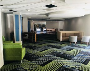 Lobby lounge area at Holiday Inn Express Towson Baltimore North.