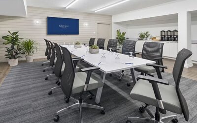 Professional meeting room with ergonomic chairs at Sea Crest Beach Hotel.