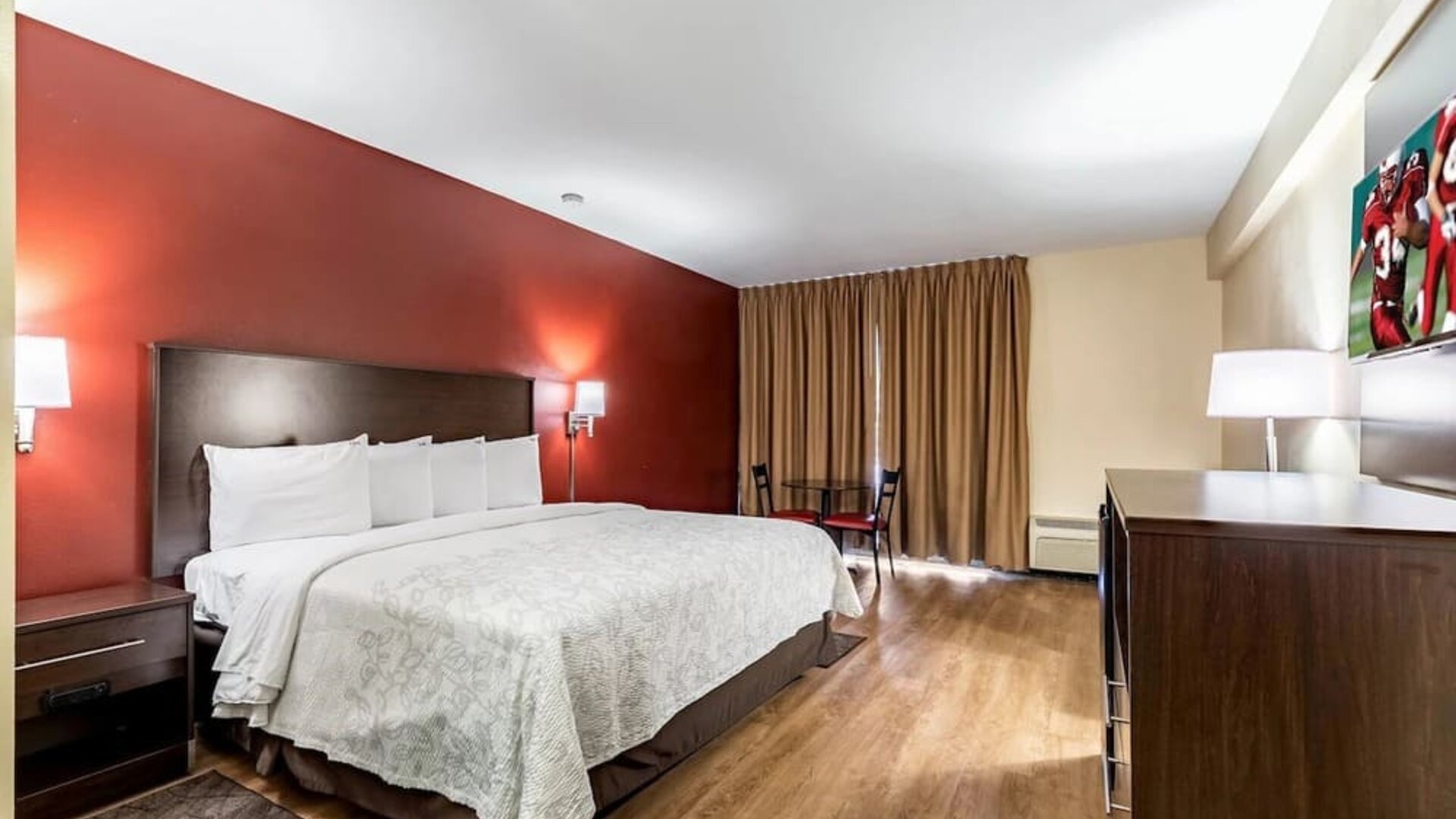 King room with workspace at Red Roof PLUS+ & Suites Houston - IAH Airport SW.