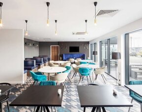 Dining hall at Hampton By Hilton Humberside Airport.