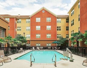 Outdoor pool at Homewood Suites By Hilton Shreveport.