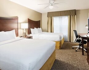 Queen room at Homewood Suites By Hilton Shreveport.