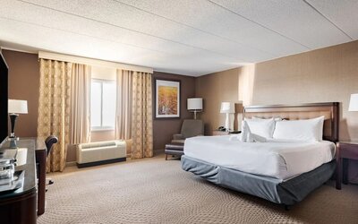 Bright and spacious day use room with work desk at Wyndham Omaha.