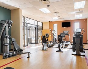 Well equipped fitness center at Wyndham Omaha.