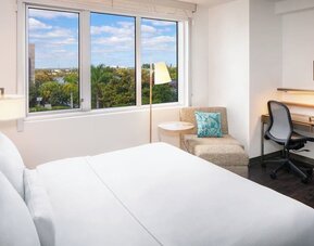 Day use room with work desk at Element Miami International Airport.