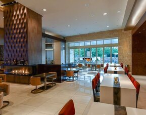 Dining area at Hilton Dallas/ Plano Granite Park.