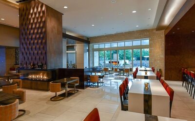 Dining area at Hilton Dallas/ Plano Granite Park.