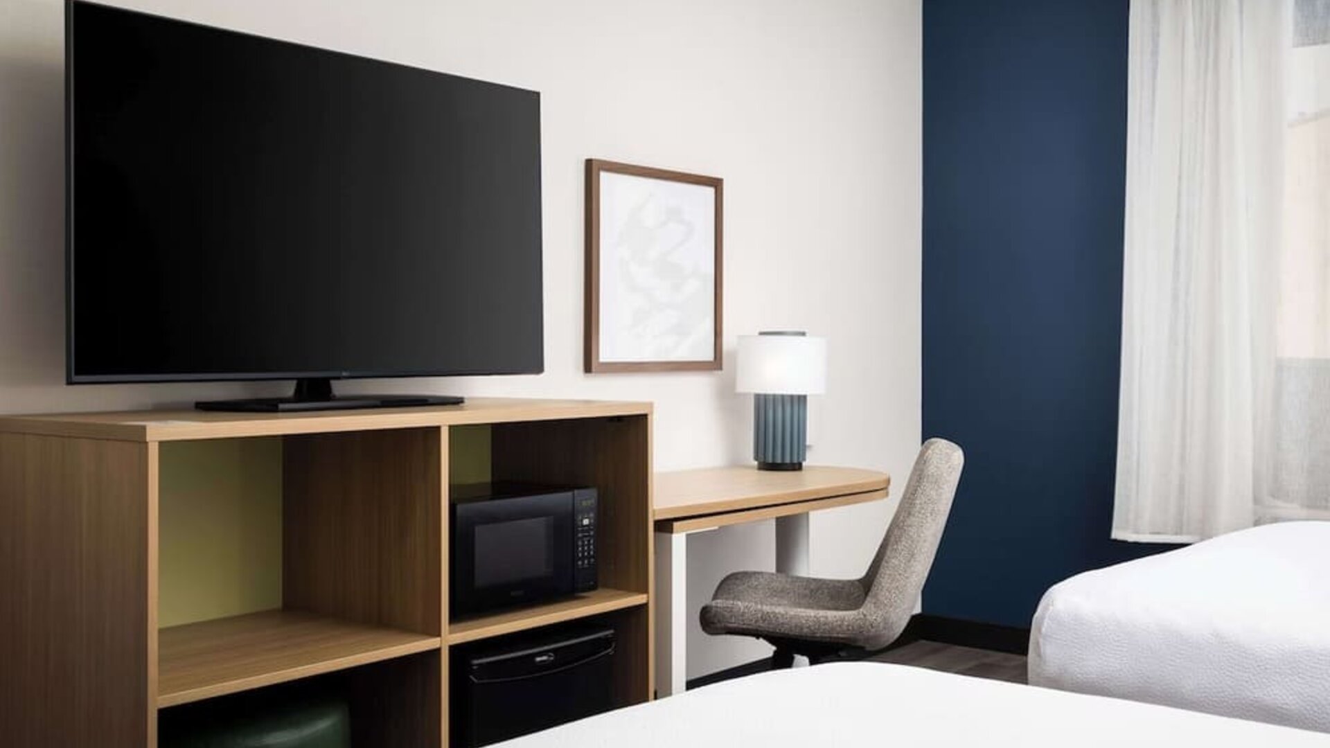 Day use room with queen beds and tv at Spark By Hilton Guelph.