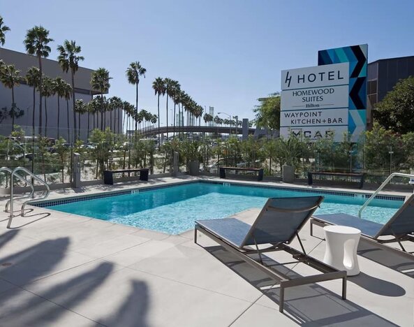 Refreshing outdoor pool at Homewood Suites By Hilton LAX Airport.