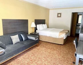 Spacious king suite at Hibiscus Inn & Suites.