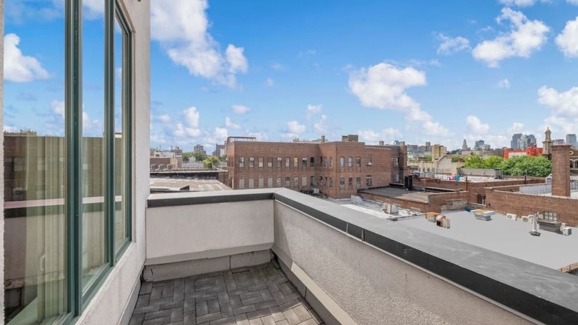 Outdoor patio at Aura Hotel Brooklyn.