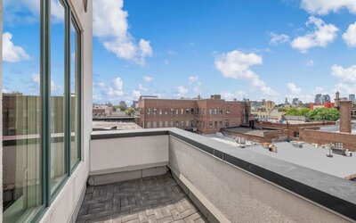 Outdoor patio at Aura Hotel Brooklyn.