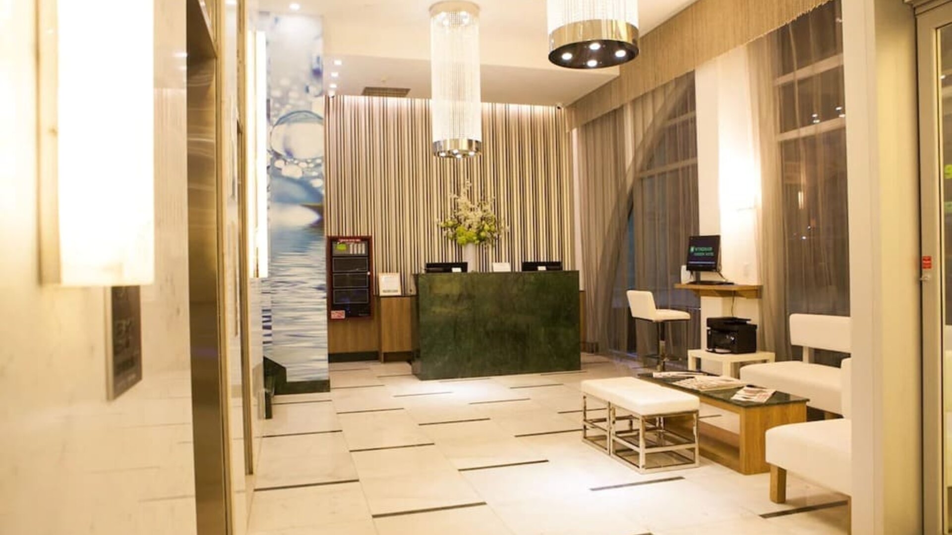 Hotel lobby and workspace at Wyndham Garden Brooklyn Sunset Park.